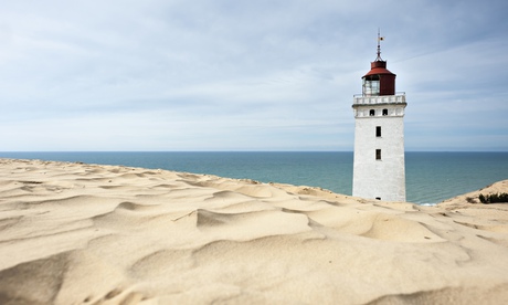 the Rubjerg Knude lighthouse which is slowly being buried by the sand.