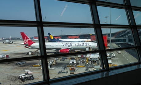 A Virgin Atlantic plane is prepared for departure at Indira Gandhi International Airport in New Delhi, India.