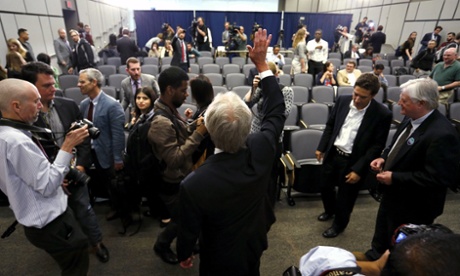 Lincoln Chafee waves as the lecture hall empties following his announcement that he would seek the Democratic nomination to be US president.
