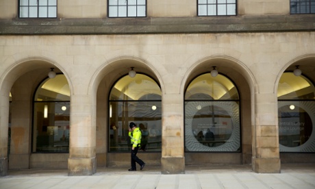 A policeman in Manchester city centre. Greater Manchester Police has lost 1100 officers since 2010.
