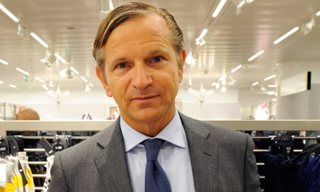 Marc Bolland in grey suit and blue tie