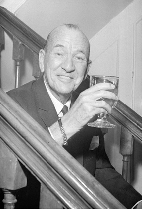 Noel Coward enjoys a tipple...