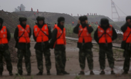 Soldiers near the site of the capsized Eastern Star.