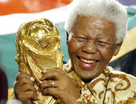 Nelson Mandela lifts the World Cup trophy in Zurich, Switzerland, after Fifa’s announcement that South Africa would host the 2010 World Cup.