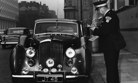 traffic warden handing out ticket