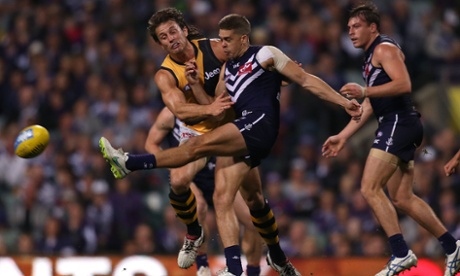 Stephen Hill gets a kick away