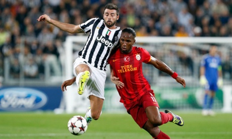 Andrea Barzagli, left, halts Didier Drogba of Galatasaray during a Champions League match in 2013.