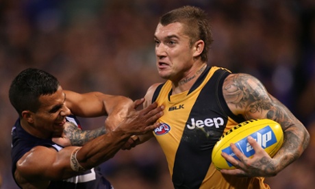 Richmond's Dustin Martin fends off Docker Danyle Pearce