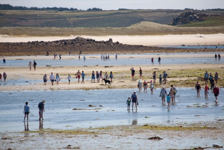 Walking from Tresco to Bryher at low tide.