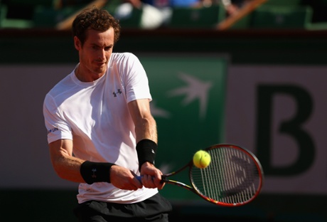 Murray plays a backhand.