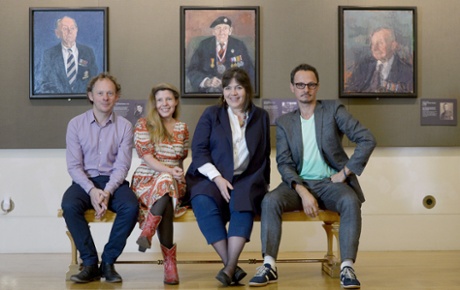 L to R: Artists James Lloyd, Clara Drummond, Catherine Goodman and Jonathan Yeo pose in front of portraits of Sgt Thomas Burke by Lloyd, trooper Cecil Newton by Peter Kuhfield and pilot Laurence Weeden by Martin Yeoman.
