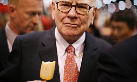 Billionaire financier and Berkshire Hathaway Chief Executive Warren Buffett eats ice-cream as he walks during the Berkshire Hathaway Annual Shareholders meeting in Omaha, Nebraska in this May 2, 2009 file photo. Buffett said he has stage 1 prostate cancer but his condition 