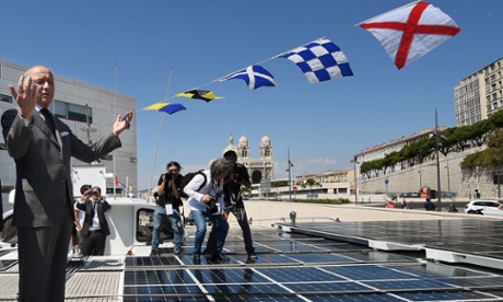 Laurent Fabius on PlanetSolar, the world’s largest solar-powered boat, in Marseille. He called for more investment in renewable energy, suggesting it could allow sub-Saharan Africa to bypass the need for fossil fuels.
