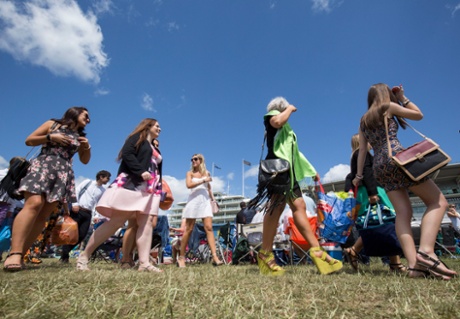 Racegoers arrive at Epsom.