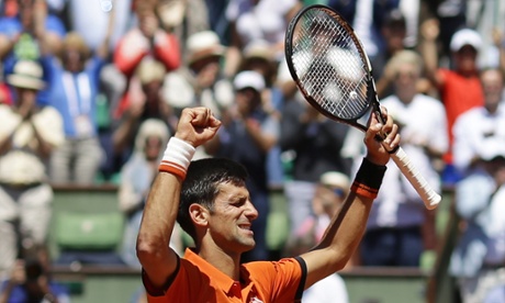 Novak Djokovic celebrates beating Andy Murray.