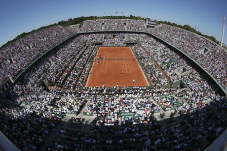 It’s a lovely day at a packed Roland Garros stadium in Paris.
