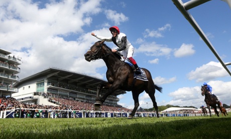 Frankie Dettori celebrates as he rides Golden Horn to victory in the Derby.