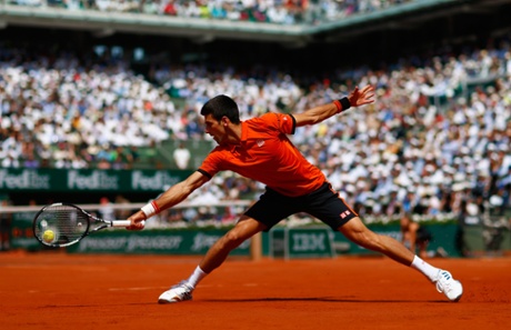 Novak Djokovic of Serbia plays a backhand.