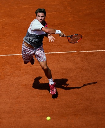 Stan Wawrinka smashes a return.