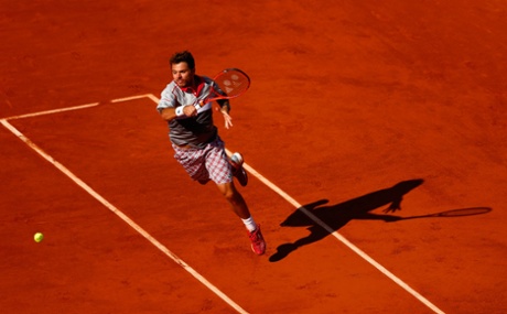 Stanislas Wawrinka smashes a return.