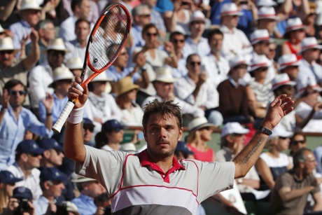 Stan Wawrinka celebrates winning the men's final.