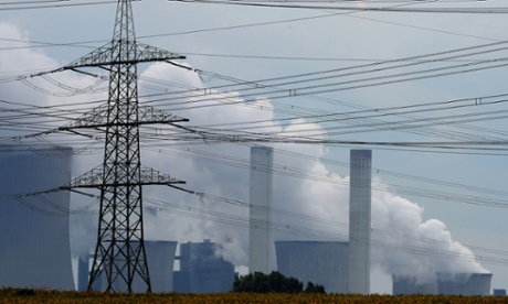 Exhaust rises from cooling towers at the new Neurath lignit coal-fired power station at Grevenbroich near Aachen, western Germany.