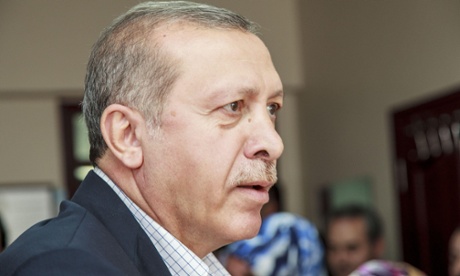 Turkey's President Recep Tayyip Erdogan casts his vote in an election that represented his biggest political setback in 13 years. 