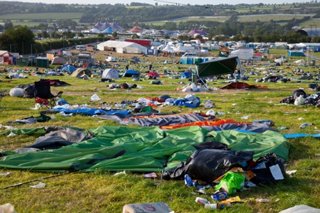 Rubbish and abandoned tents in the camp site at Glastonbury festival, UK on 1 July 2013