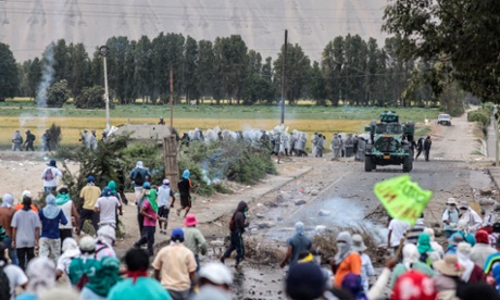 Police fighting local inhabitants in Cocachacra, southern Peru, protesting the proposed Tia Maria mine.