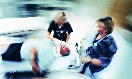 Hospital staff with patient