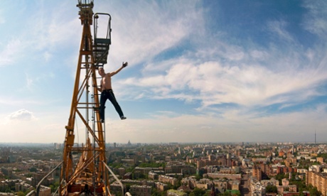 The daredevil Muscovite: under an assumed name, urban climber Max Polazov – pictured atop the Garden Ring Hotel – has been scaling his home city’s tallest buildings since he was 17.