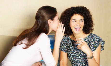 Two women gossiping