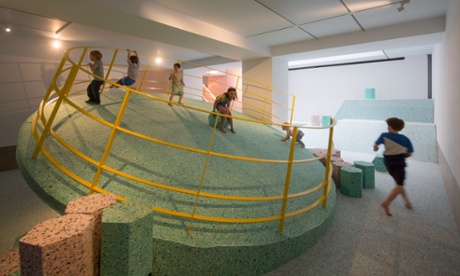 Children playing on Assemble’s squidgy-foam re-creation of the Churchill Gardens playground at Riba.