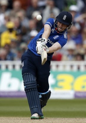 Eoin Morgan smashes one for six.