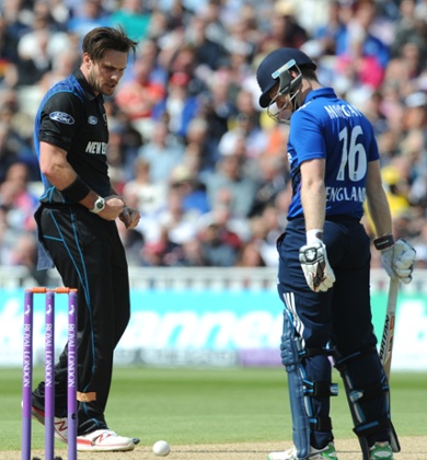 Mitchell McClenaghan celebrates after trapping Eoin Morgan for LBW.