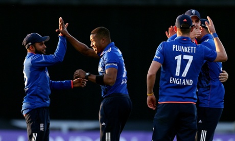 England's Chris Jordan celebrates taking the last New Zealand wicket.