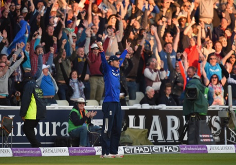 Alex Hales of England takes a catch on the boundary and New Zealand are all out.