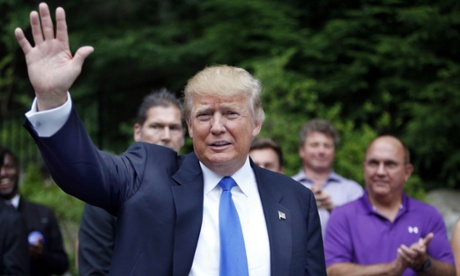 Republican presidential candidate Donald Trump  arrives at a house party in Bedford, New Hampshire.