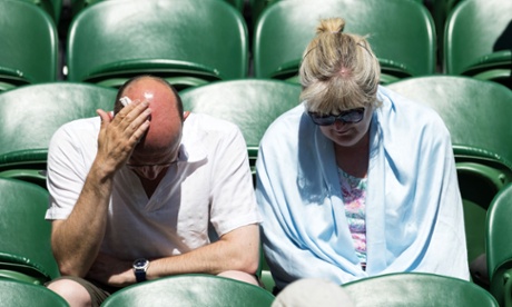 Hot spectators on the centre court at Wimbledon Tennis Championships.