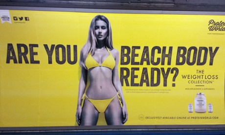 A Protein World advert displayed in an underground station in London.