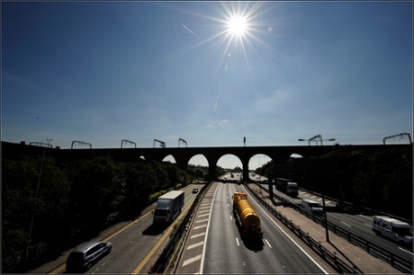 Vehicles drive on the M60 Manchester orbital motorway, the boundary of the Government's proposed congestion charge scheme for the city, due to be introduced from 2013.