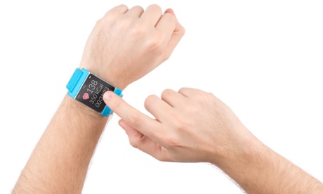 Male finger taps on the screen of the smart watch with fitness app