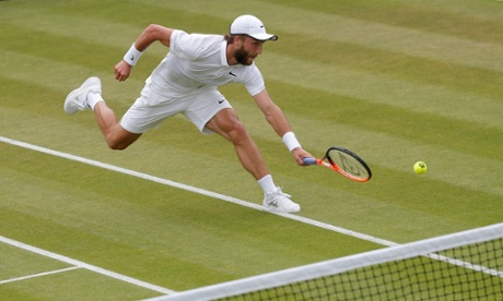 Liam Broady chases the ball.