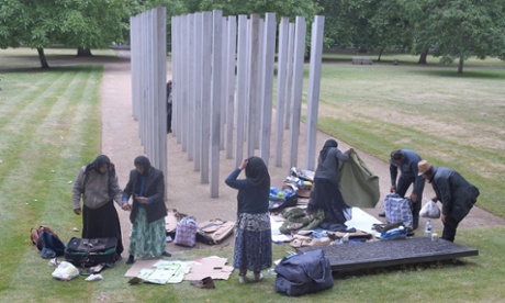 East european migrants with belongings at 7/7 memorial in Hyde Park