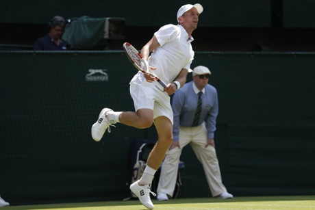 Jarkko Nieminen watches his shot.