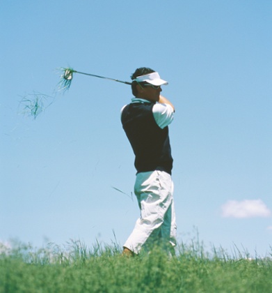 A golfer dresses for the heat. Sort of.