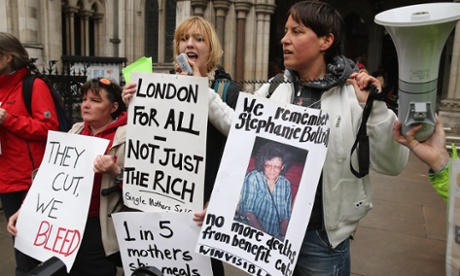 Demonstrators protest against government changes to the welfare system and the proposed ‘bedroom tax’ outside the high court on 15 May 2013 in London.