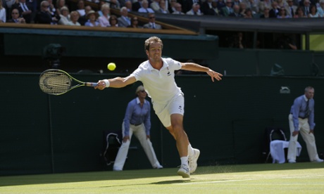 Richard Gasquet, eyes closed, attempts a return to Djokovic.