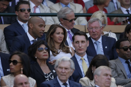 Bosnian model Andrea Rajacic separates former Arsenal and Man Utd rivals Thierry Henry and Sir Alex Ferguson in the Royal Box.