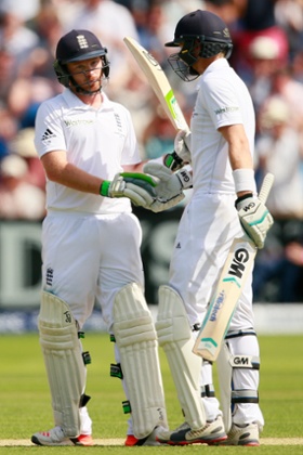 And celebrates with a handshake.